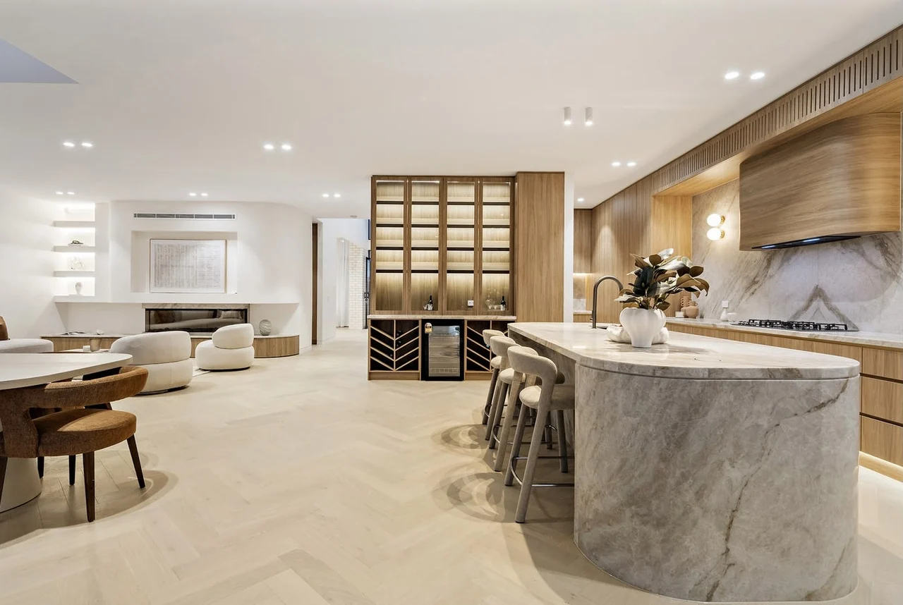 Kitchen island overlooking dining and living at Arthur, Ryde